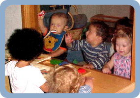 photo of children at table